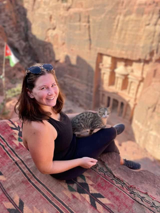 Sitting with kitten at viewpoint in Petra, Jordan